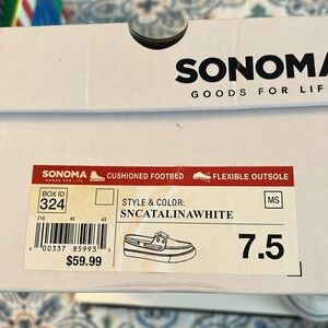 White boat shoes.  Hardly worn. Size 7-1/2